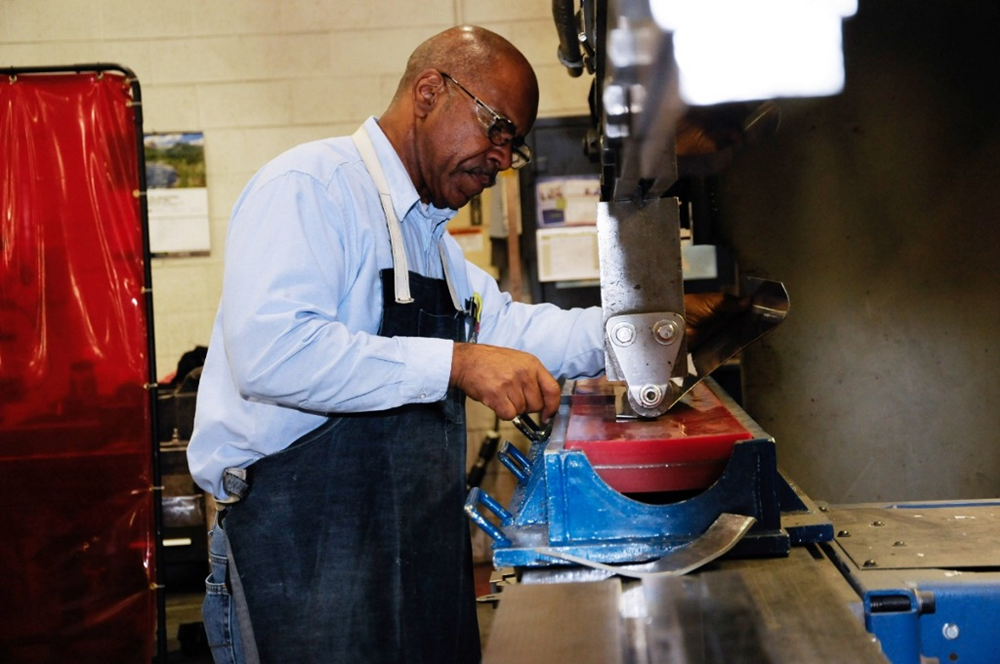 A BW Packaging team member fabricating parts.